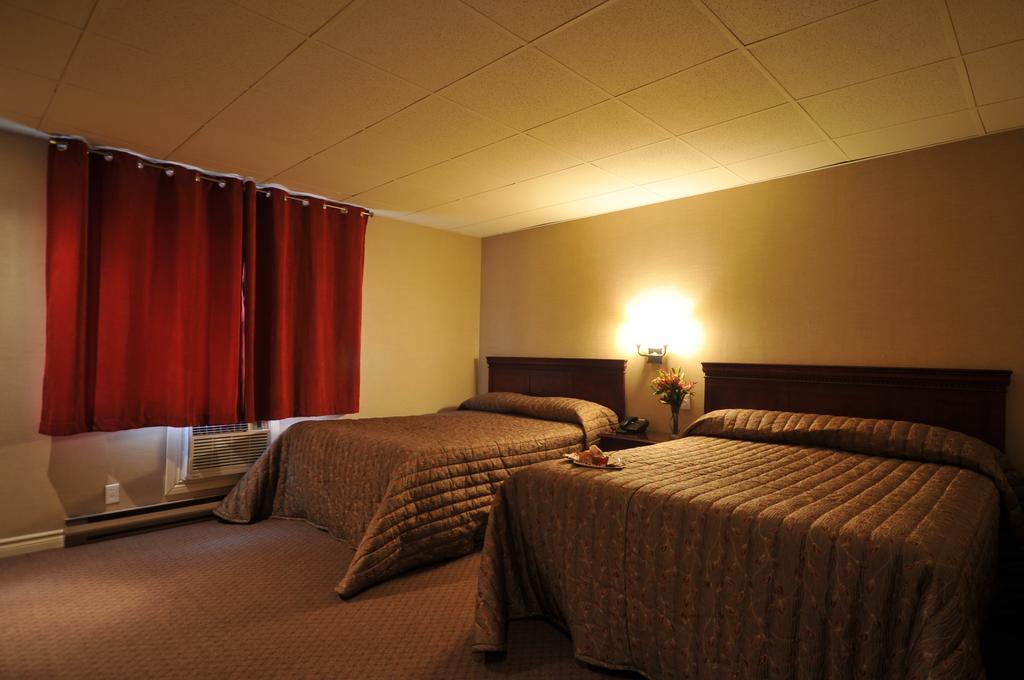 Motel Capri Et Suites Repentigny Exterior photo